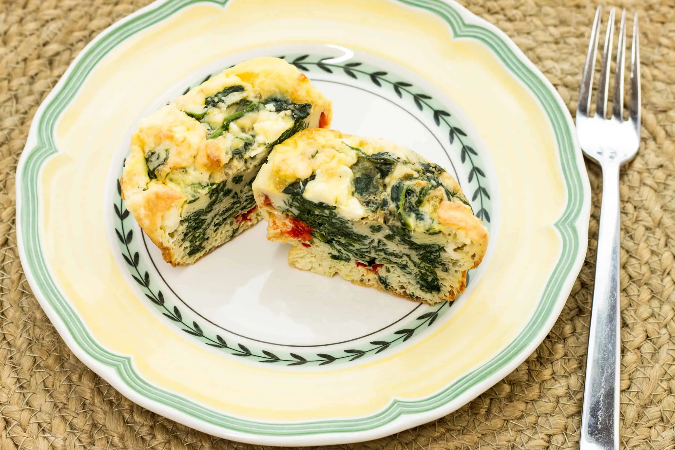 Keto-friendly spinach, feta, bell pepper egg cups.