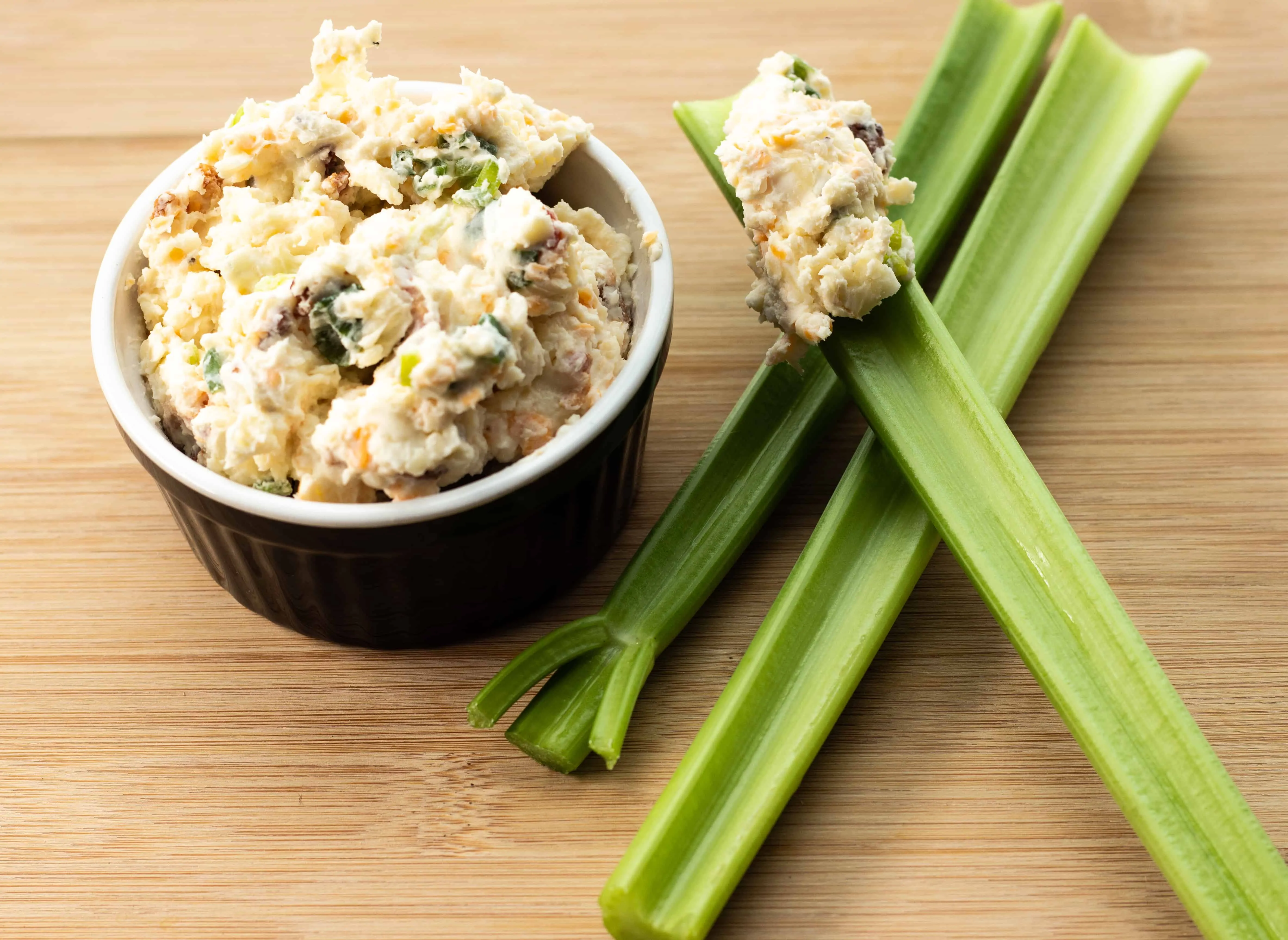 Creamy and keto-friendly Bacon, Onion, and Cheese Dip.