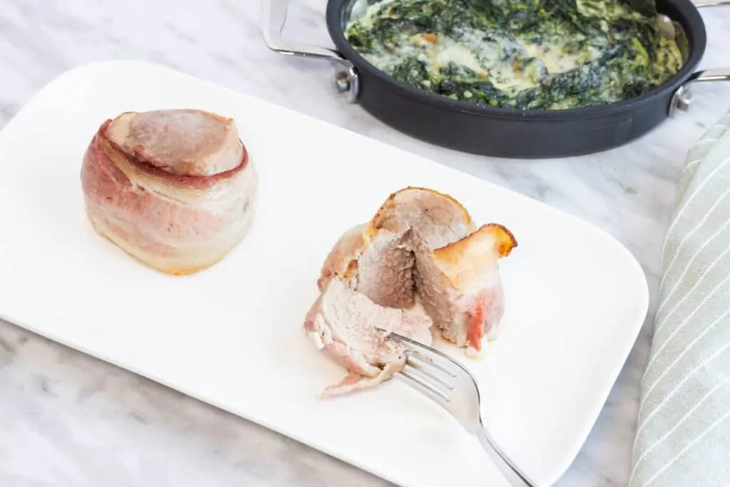 bacon wrapped pork tenderloin with creamed spinach