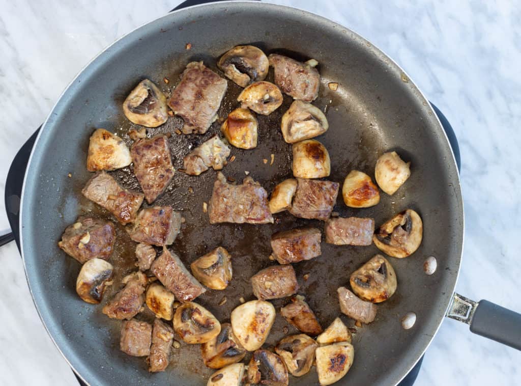 Cook for 2 to 3 minutes for medium-rare, checking doneness by cutting into a piece rather than guessing by time.