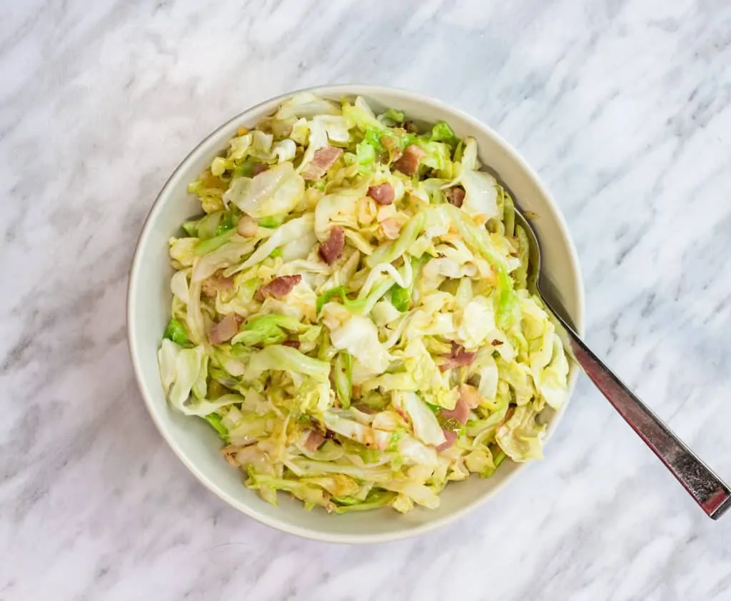 Cooked Skillet Cabbage with Bacon and Garlic.