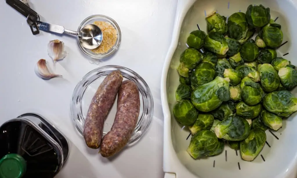 sausage, brussels sprouts, garlic, and onion - ingredients for Italian Brussels Sprouts with Sausage