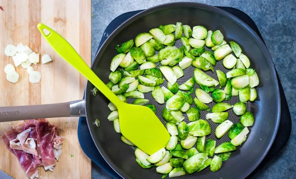 Slow pan-roasting Brussels sprouts