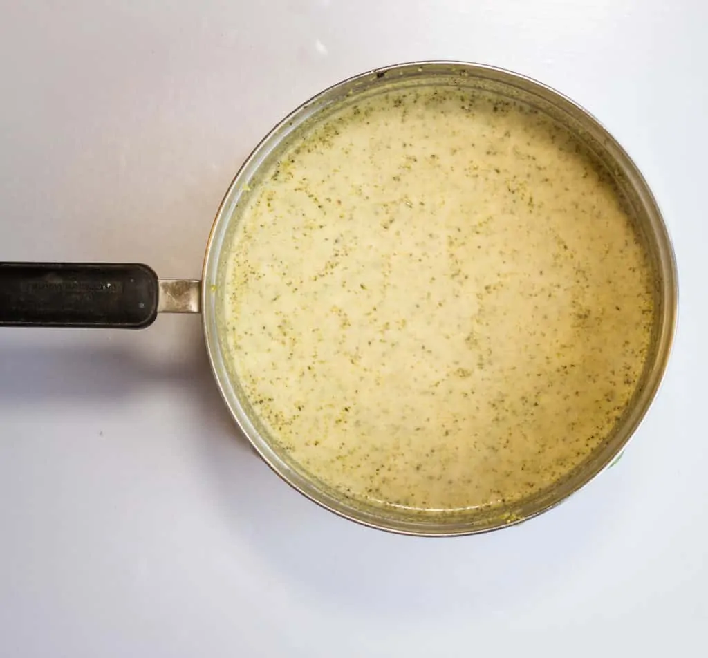 Pureed Cream of Roasted Broccoli Soup in a pot.
