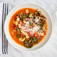 keto-friendly beefy minestrone soup with a sprinkle of cheese