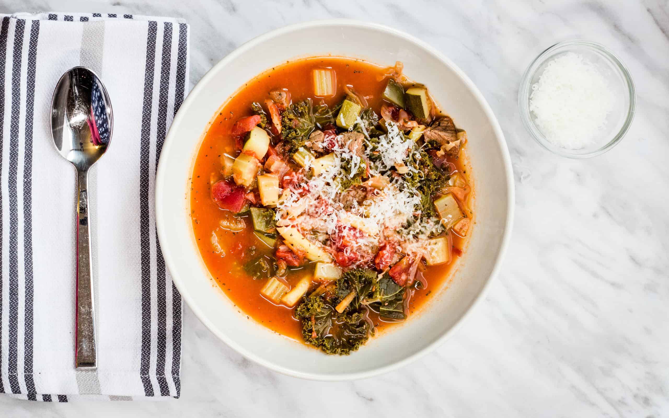 keto-friendly beefy minestrone soup with a sprinkle of cheese
