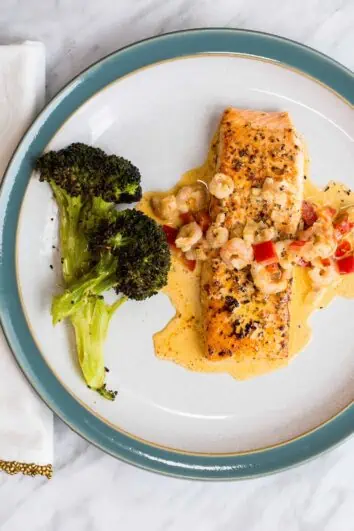 Keto cajun salmon with broccoli on a plate