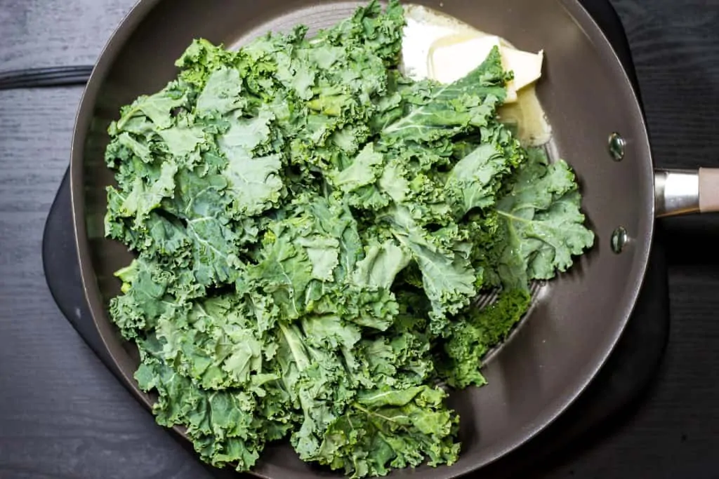 kale with butter in a skillet
