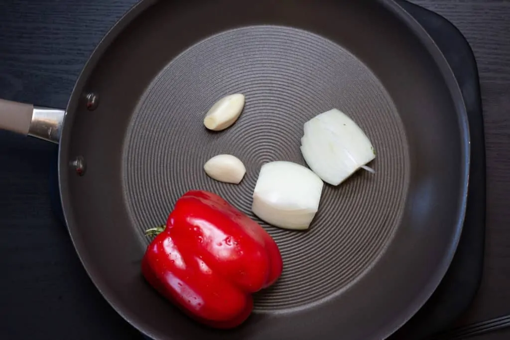 Red pepper, onion and garlic in a skillet