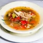 A bowlful of Mexican Turkey Soup with lime.