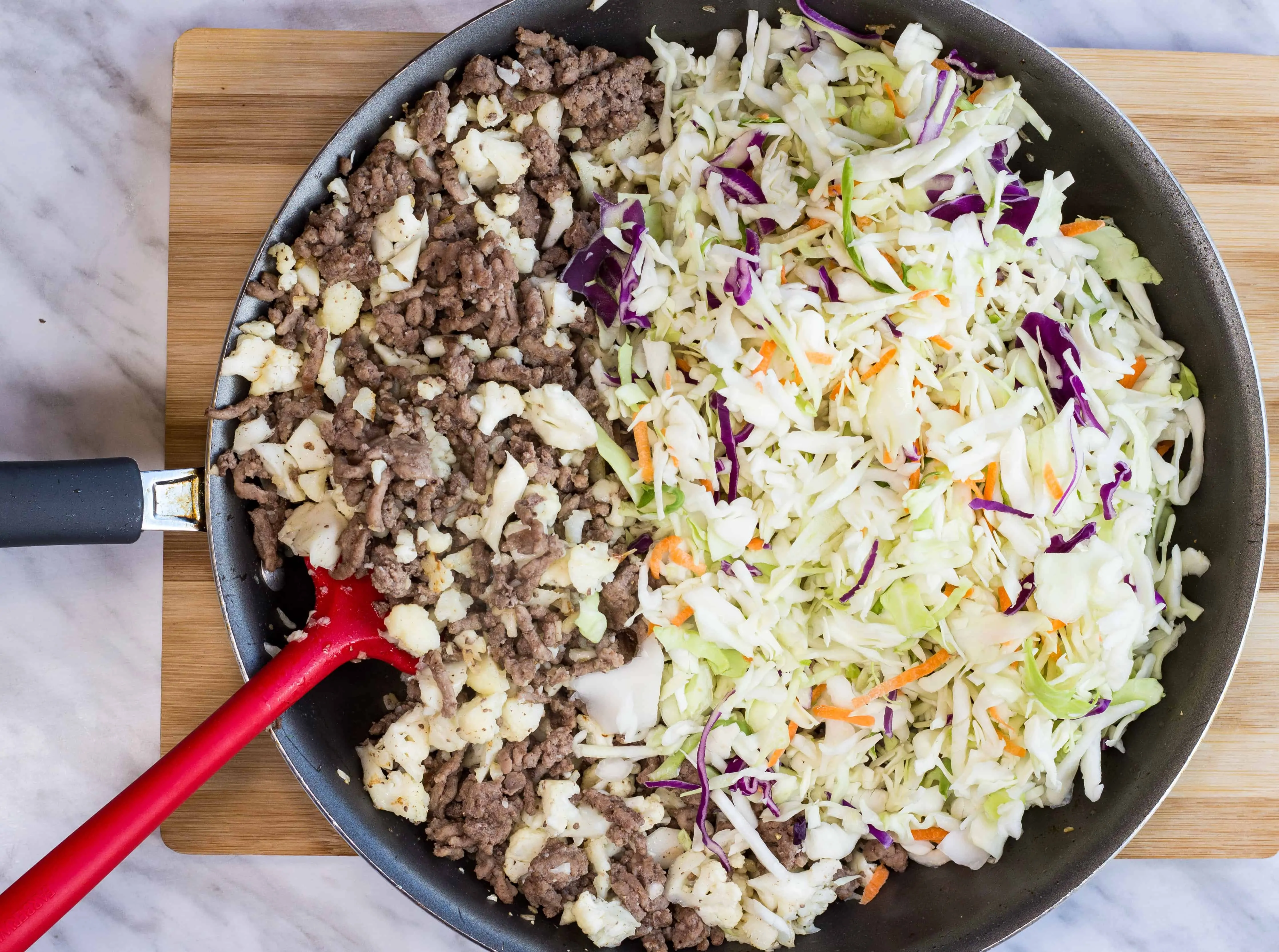 add the cabbage shreds to the skillet