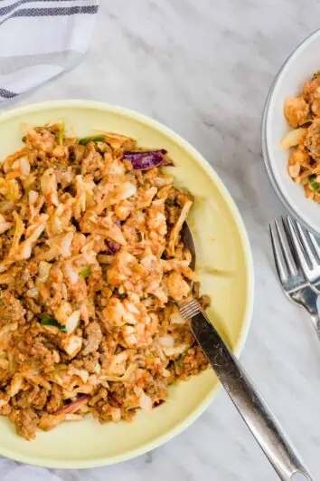 keto cabbage roll in a bowl in a serving bowl with forks