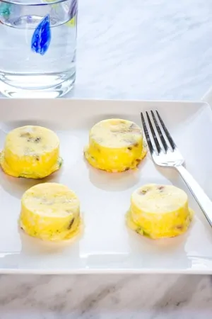 Keto Egg Bites are becoming more popular but are Keto egg bite recipes  easy to make? Yes they are!! We love cooking them in our instant pot (see  the