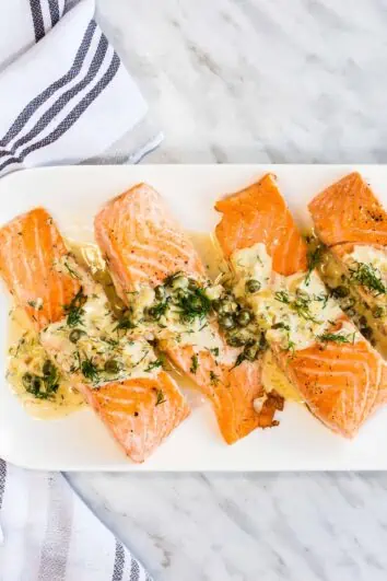 Keto Salmon with Lemon Dill Cream Sauce on a serving plate