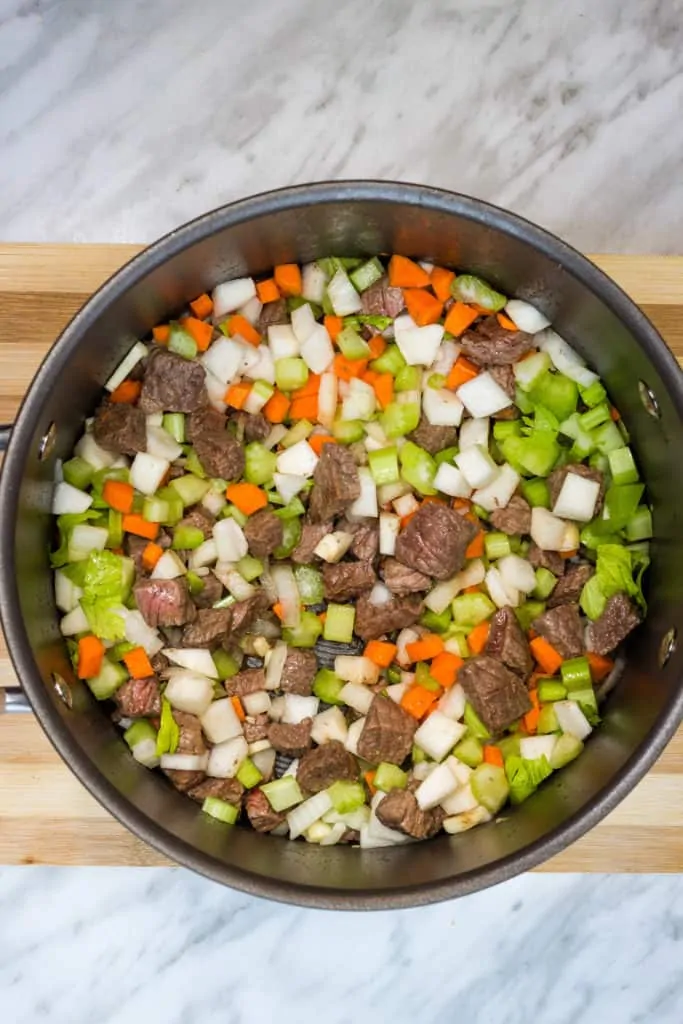 all veggies and beef into a soup pot