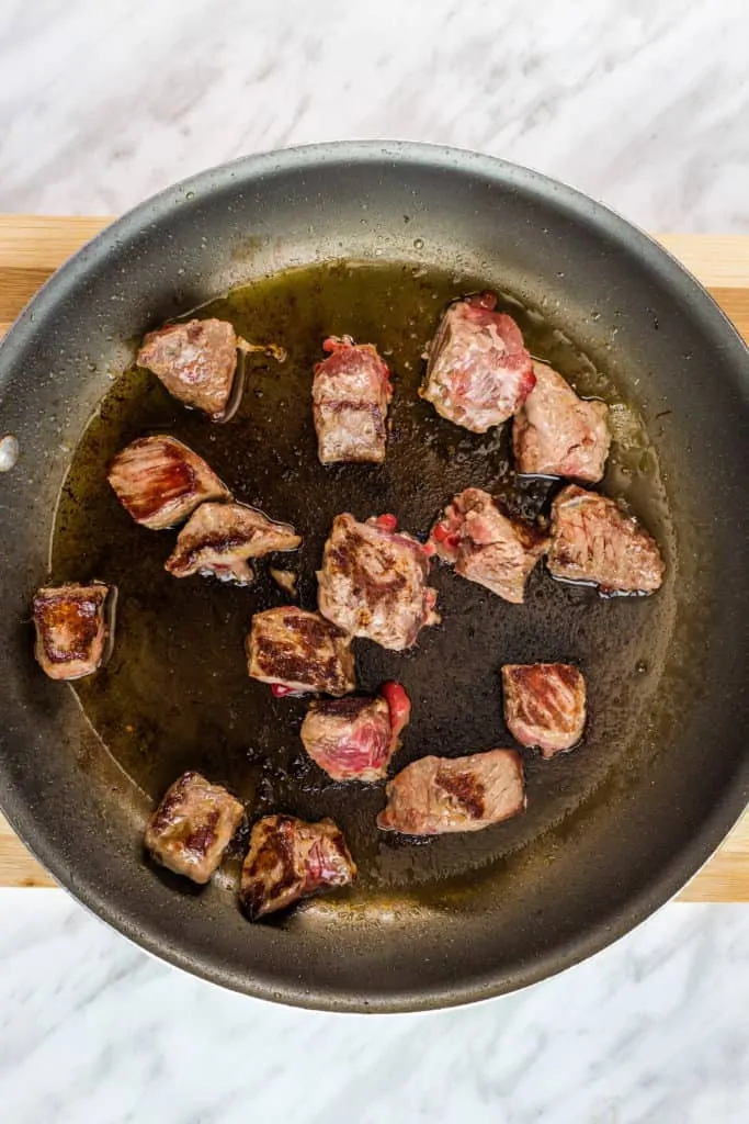 browning the beef in a skillet