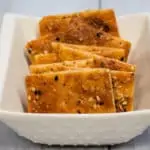 crispy keto cheesy crackers in a dish