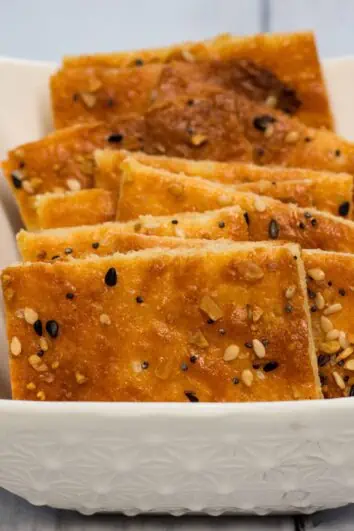 crispy keto cheesy crackers in a dish
