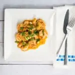 keto new orleans BBQ shrimp on a serving plate