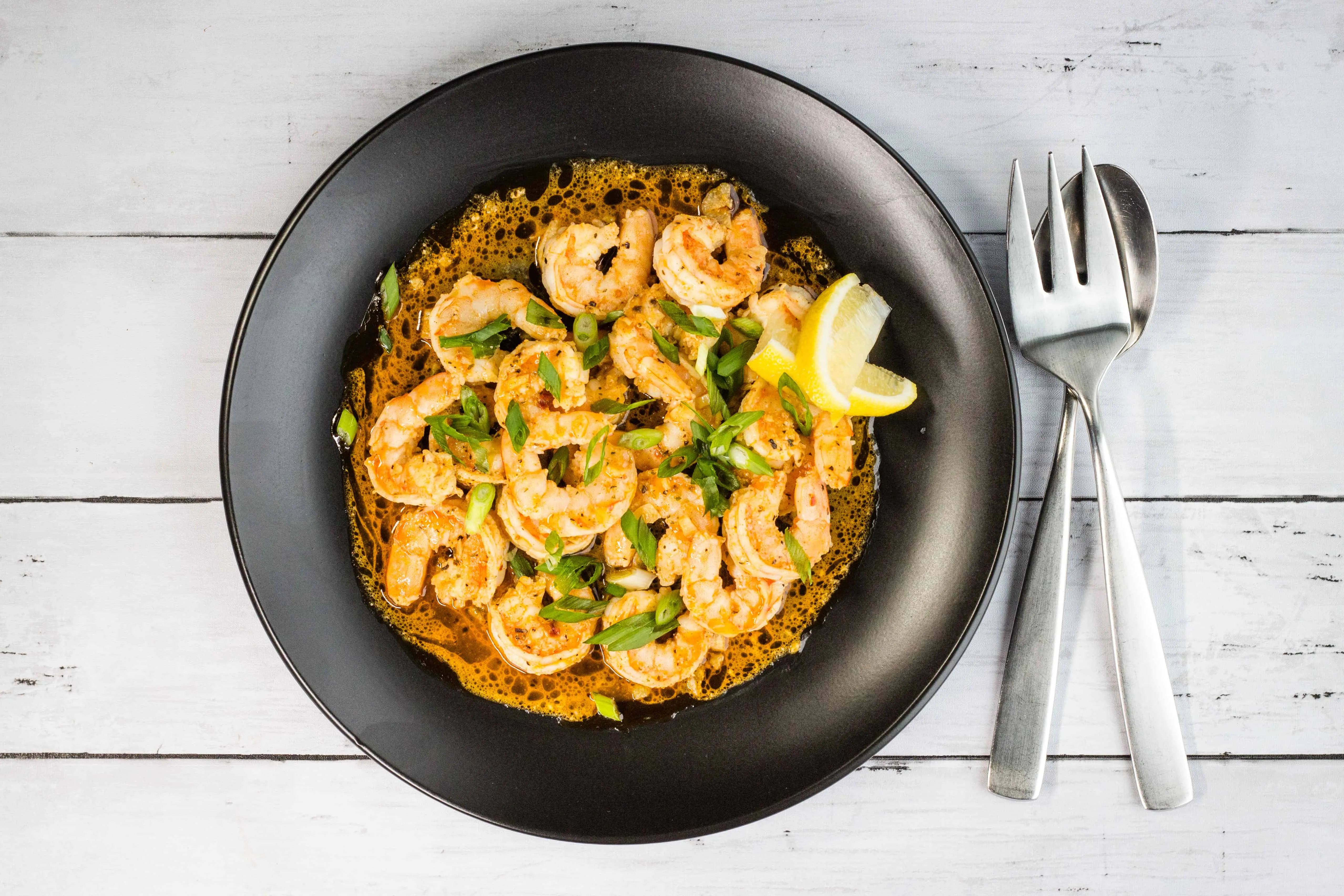 Keto New Orleans BBQ Shrimp served on a plate