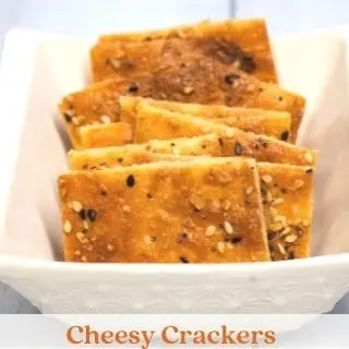 cheesy crackers in a white dish