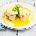 keto eggs benedict chaffle with oozing egg yolk