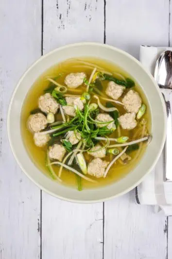 keto wonton soup in a bowl with a spoon