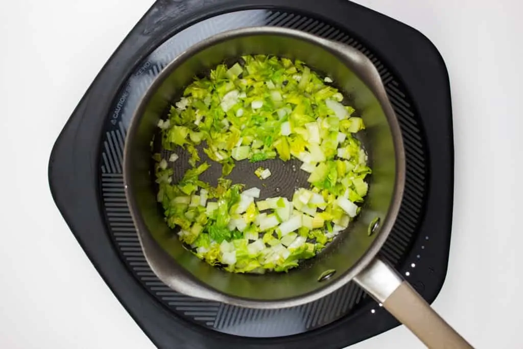 onions, garlic, celery, sauteeing in pot