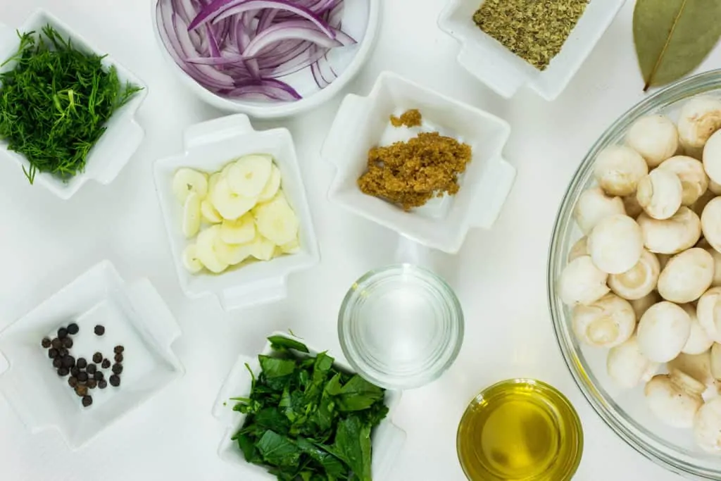 prepped ingredients to make marinated mushrooms