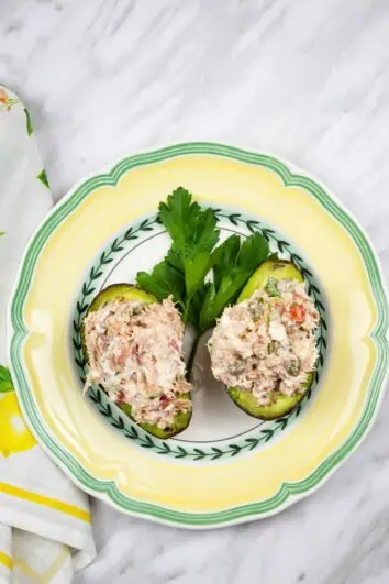 mediterranean tuna salad served in avocado cups