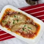 Sausage Parmigiana on a white plate