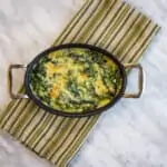 steakhouse creamed spinach in a cast iron serving dish