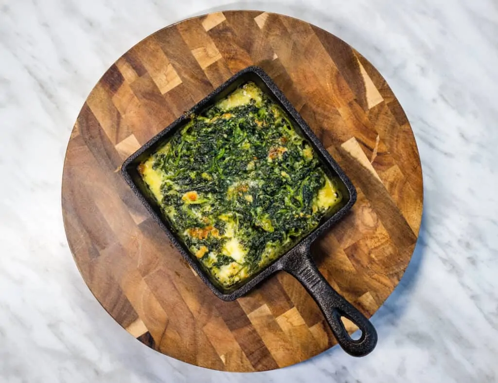 steakhouse creamed spinach in a square serving dish