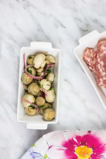 Marinated Mushrooms, cheese, salami and a glass of wine.