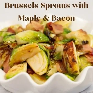 keto brussels sprouts with maple and bacon in a scalloped bowl