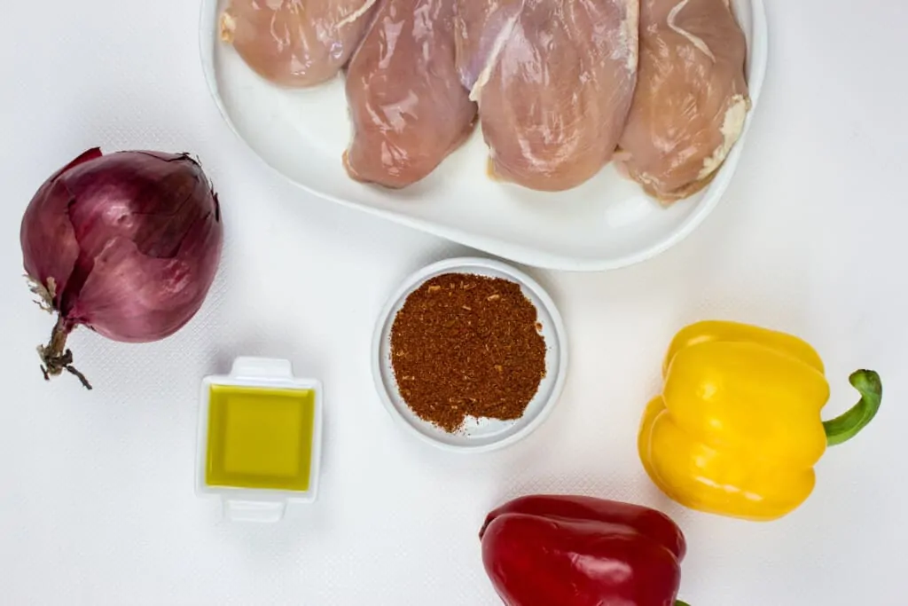 chicken, peppers, onion, seasoning and oil to make air fryer fajitas