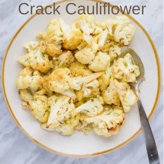 keto crack cauliflower in a serving bowl with a spoon