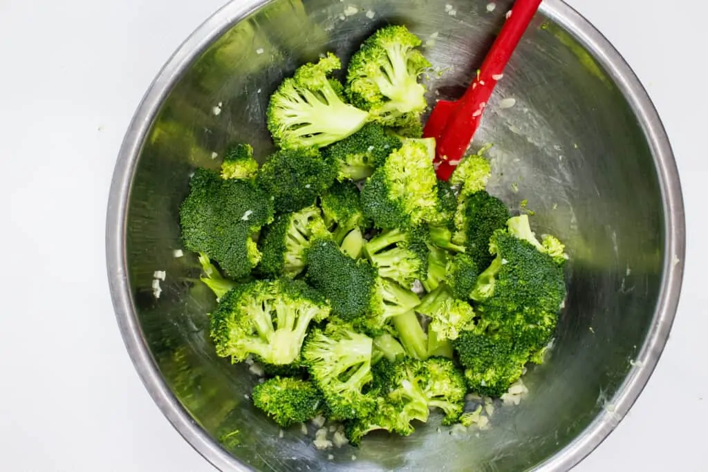 toss the broccoli with the garlic, butter and oil