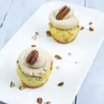 two pecan cupcakes on a plate