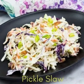 keto pickle slaw on a black plate
