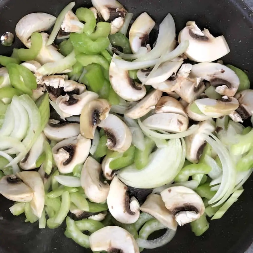 stir fry the veggies - celery, onion, mushrooms) for the keto chicken stir fry