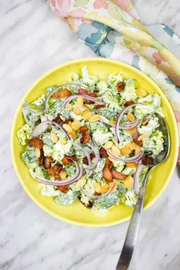 keto broccoli salad with bacon in a yellow bowl