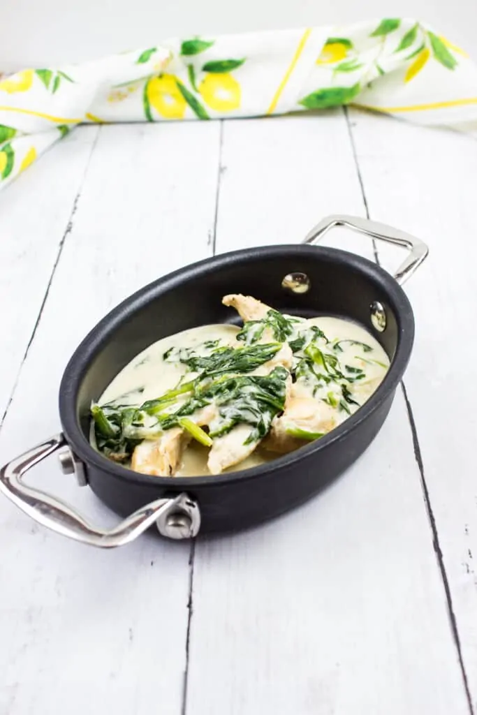 keto chicken florentine in an oval single serve dish