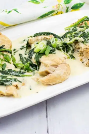 keto chicken florentine on a rectangular platter