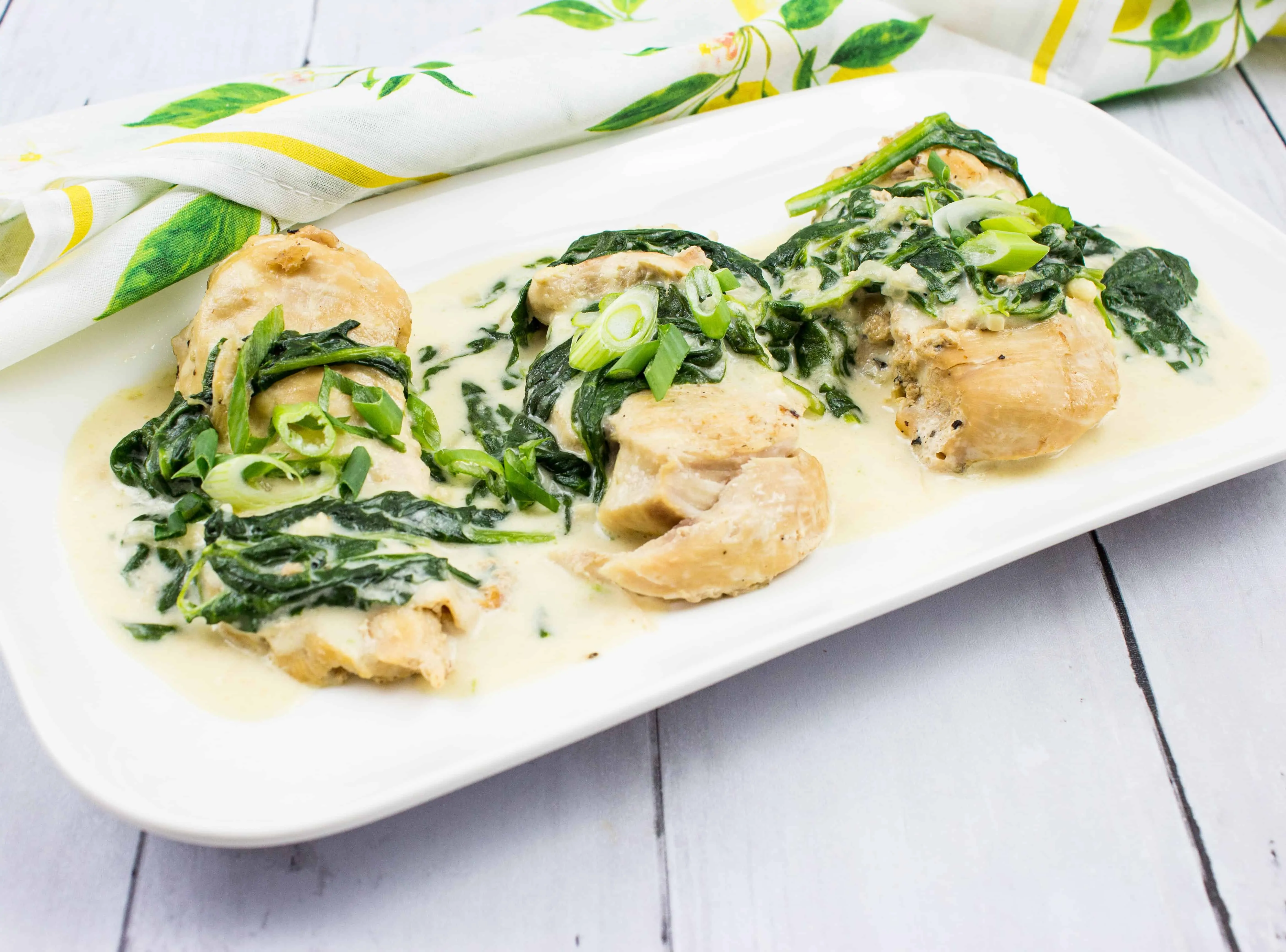 keto chicken florentine on a rectangular platter