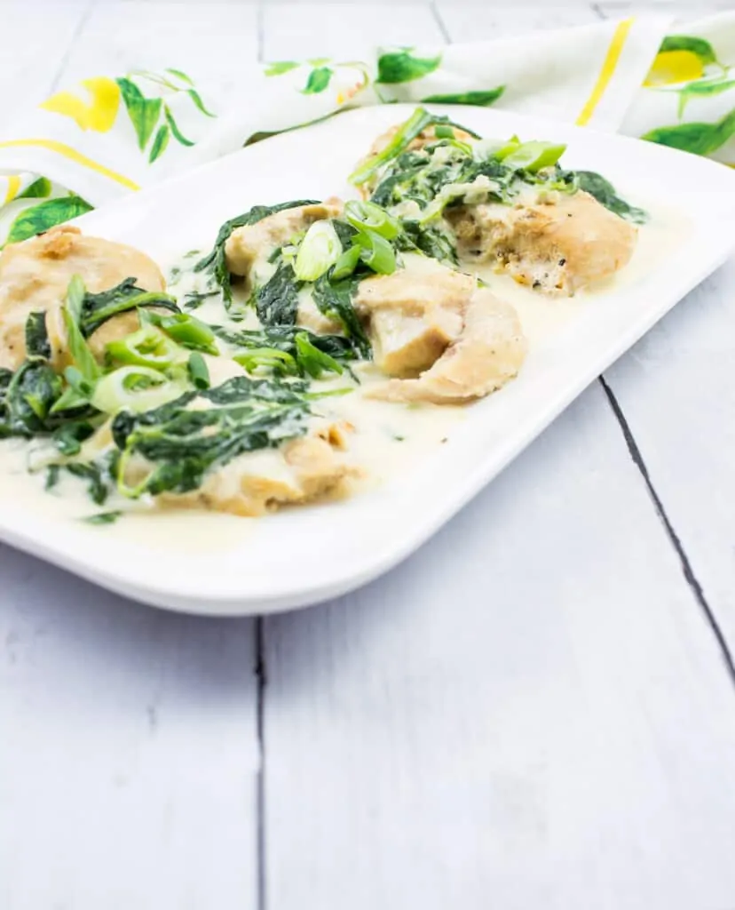 keto chicken florentine on a rectangular platter