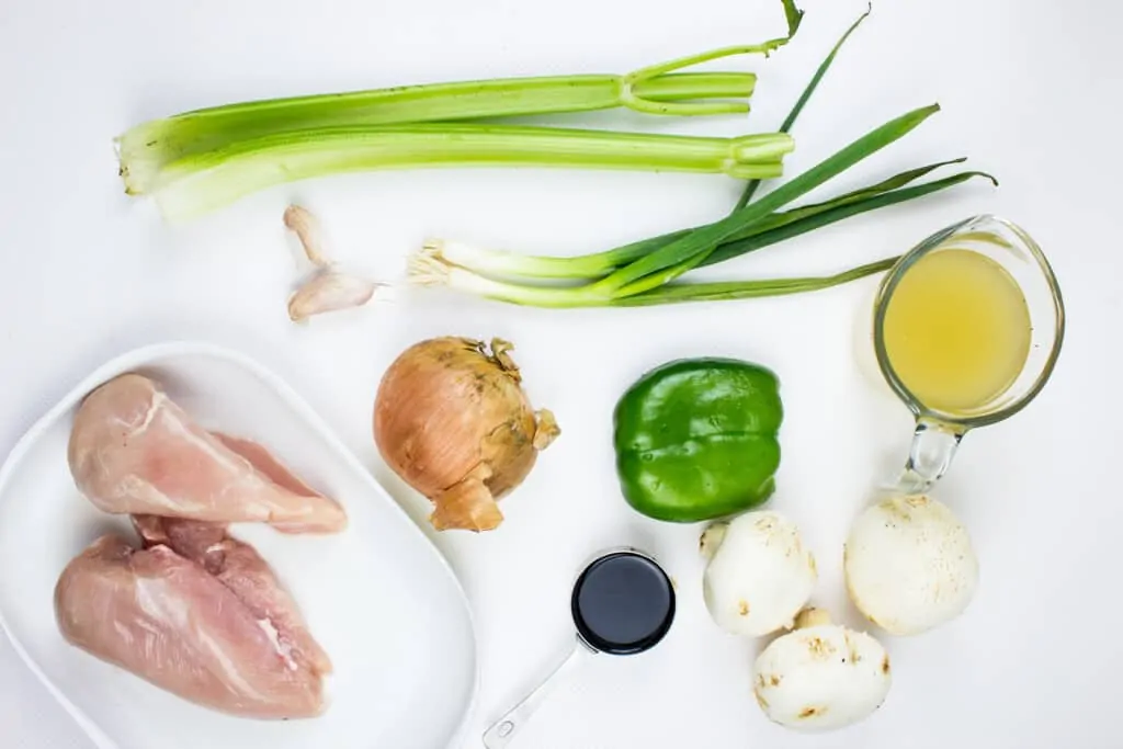 keto chicken stir fry ingredients (chicken, onion, mushroom, peppers, chicken broth, soy sauce, celery)