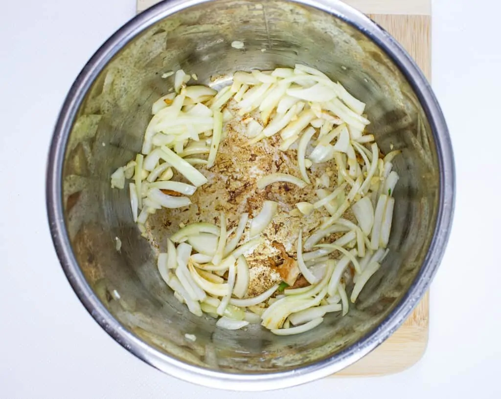 sautee the onions and garlic in the instant pot