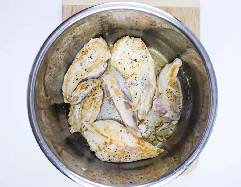 sautee the chicken in the instant pot until brown