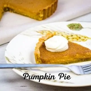 keto pumpkin pie on a plate with a fork